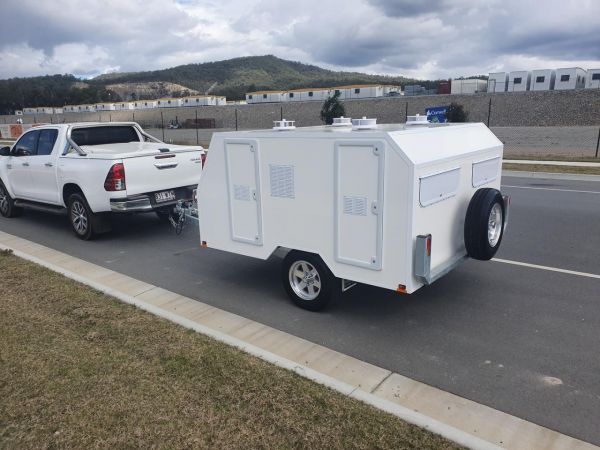 2024 McNeill 4 berth dog trailer image