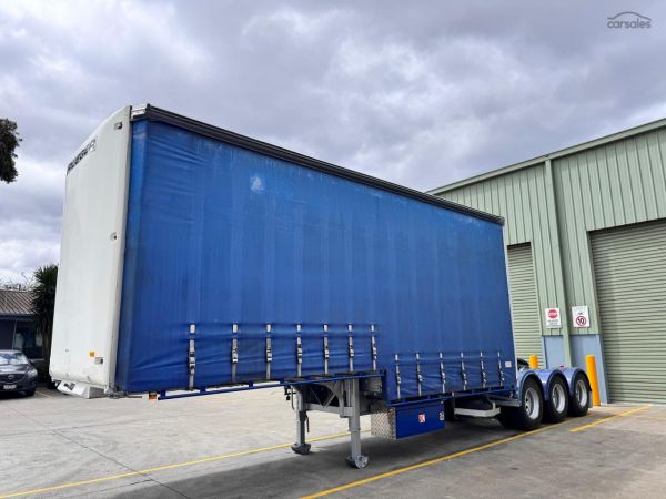 2007 Krueger  ST3 12 Pallet A Drop Deck Curtain Sider image
